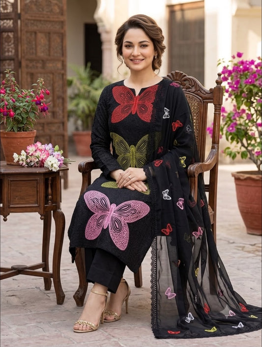 Black Butterfly Chikankari Embroidered 3 Piece Lawn Suit – Inspired by Maria.B – model wearing seated pose – image 1 of 4